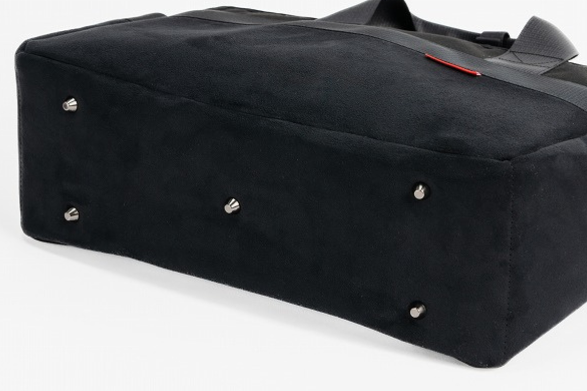 Bottom studs to support the base when placed on a floor or table.