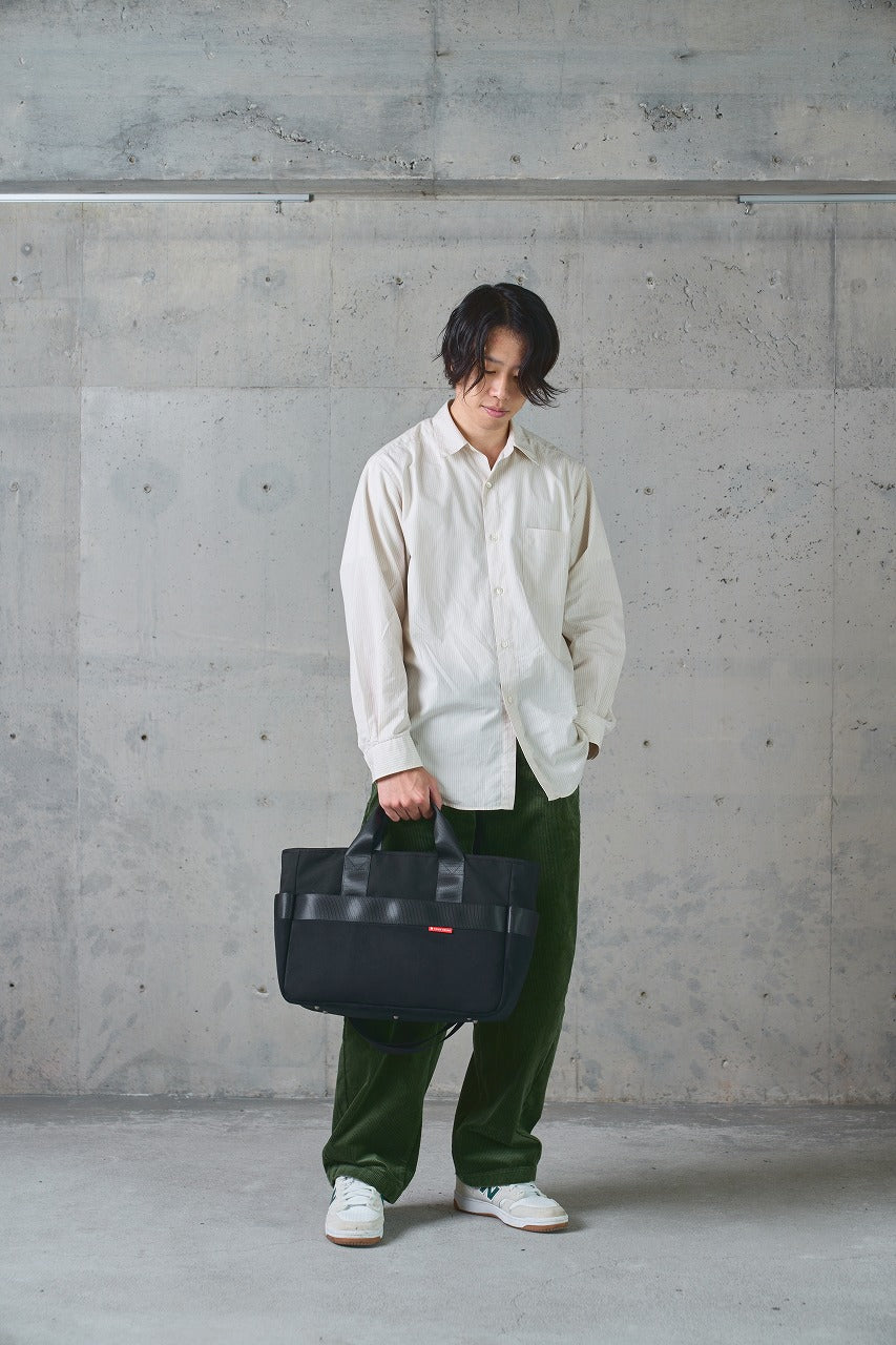 Combining a suede-like texture with seatbelt-style weaving